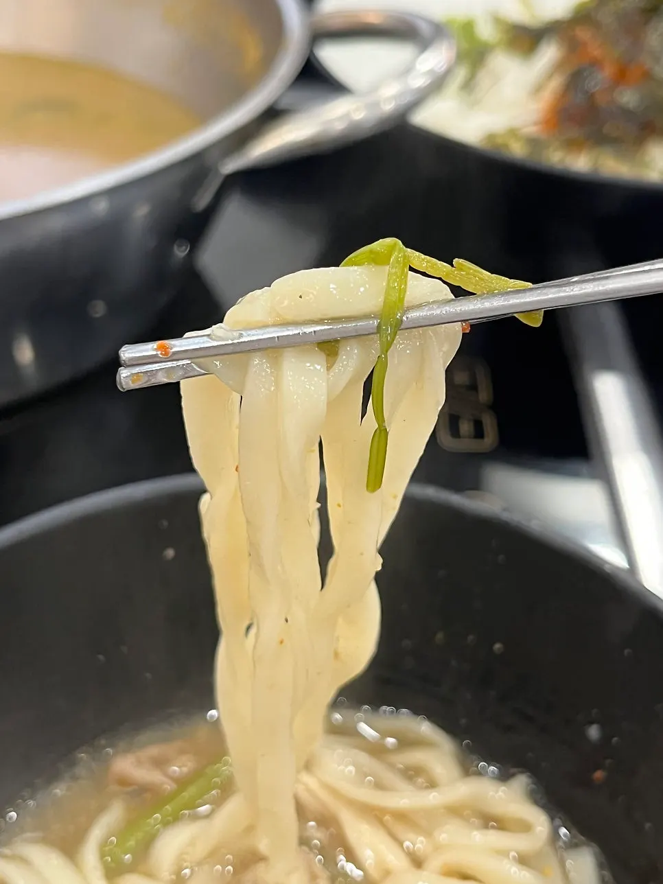 House-made kalguksu noodles boiled in the broth
