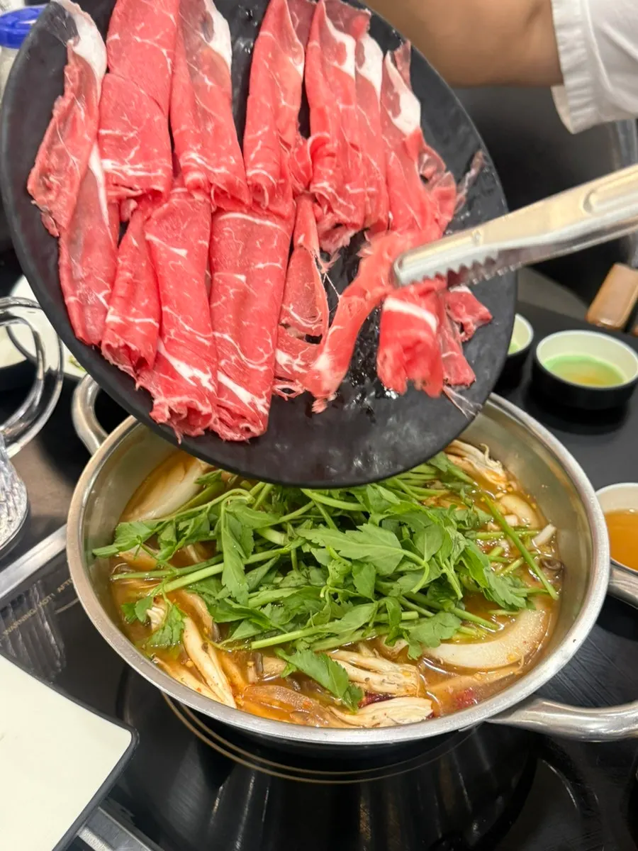 Shabu meat cooking in broth
