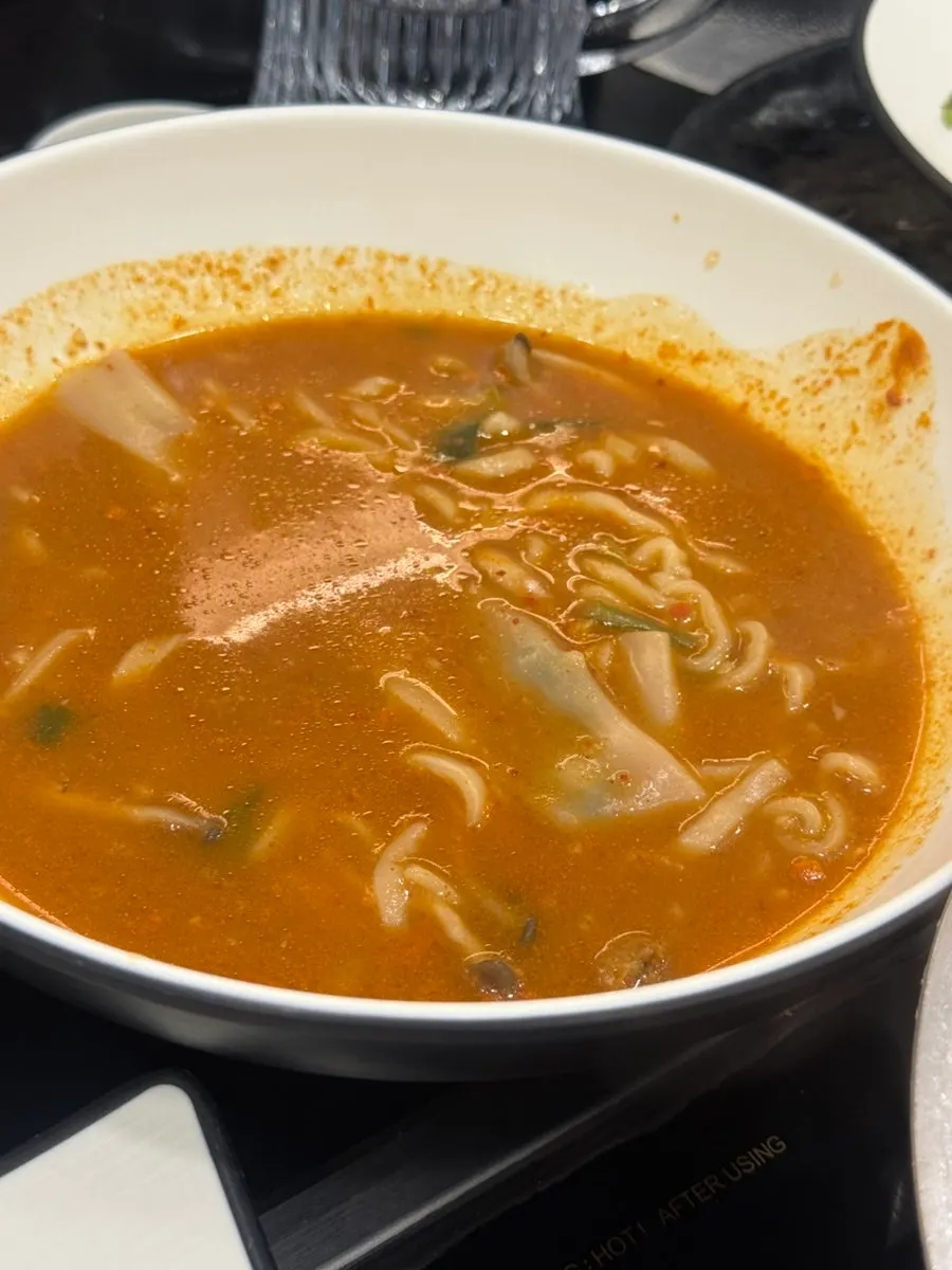 Shabu-shabu with vegetables and dipping sauce