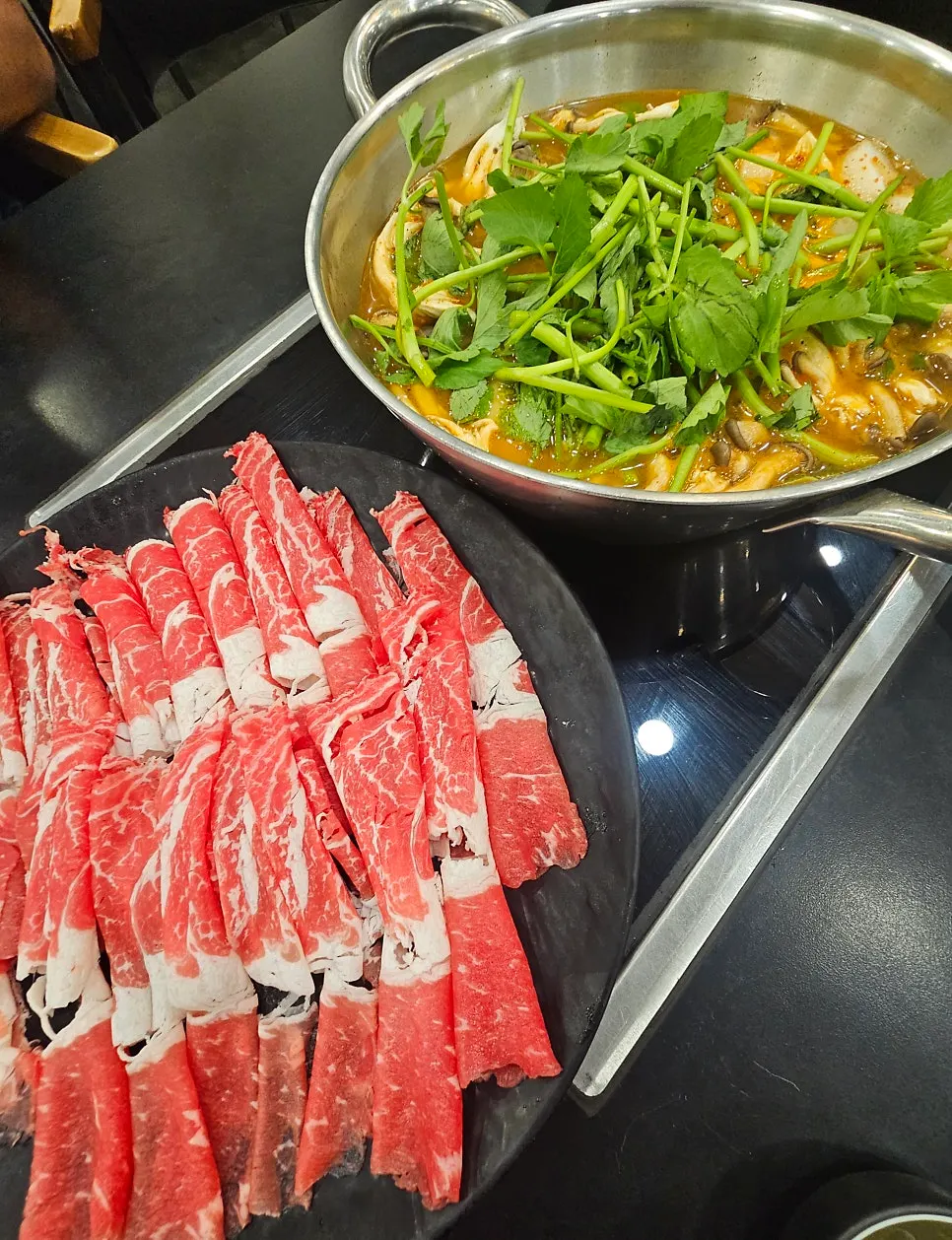 Boiling shabu kalguksu broth