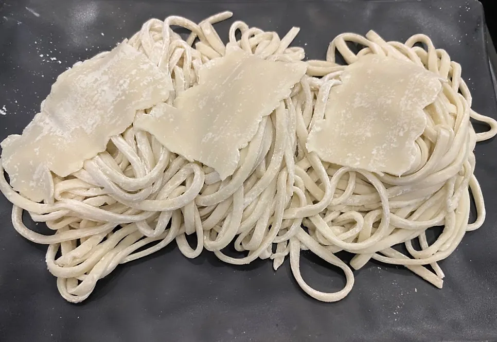 Table set for three servings of shabu kalguksu