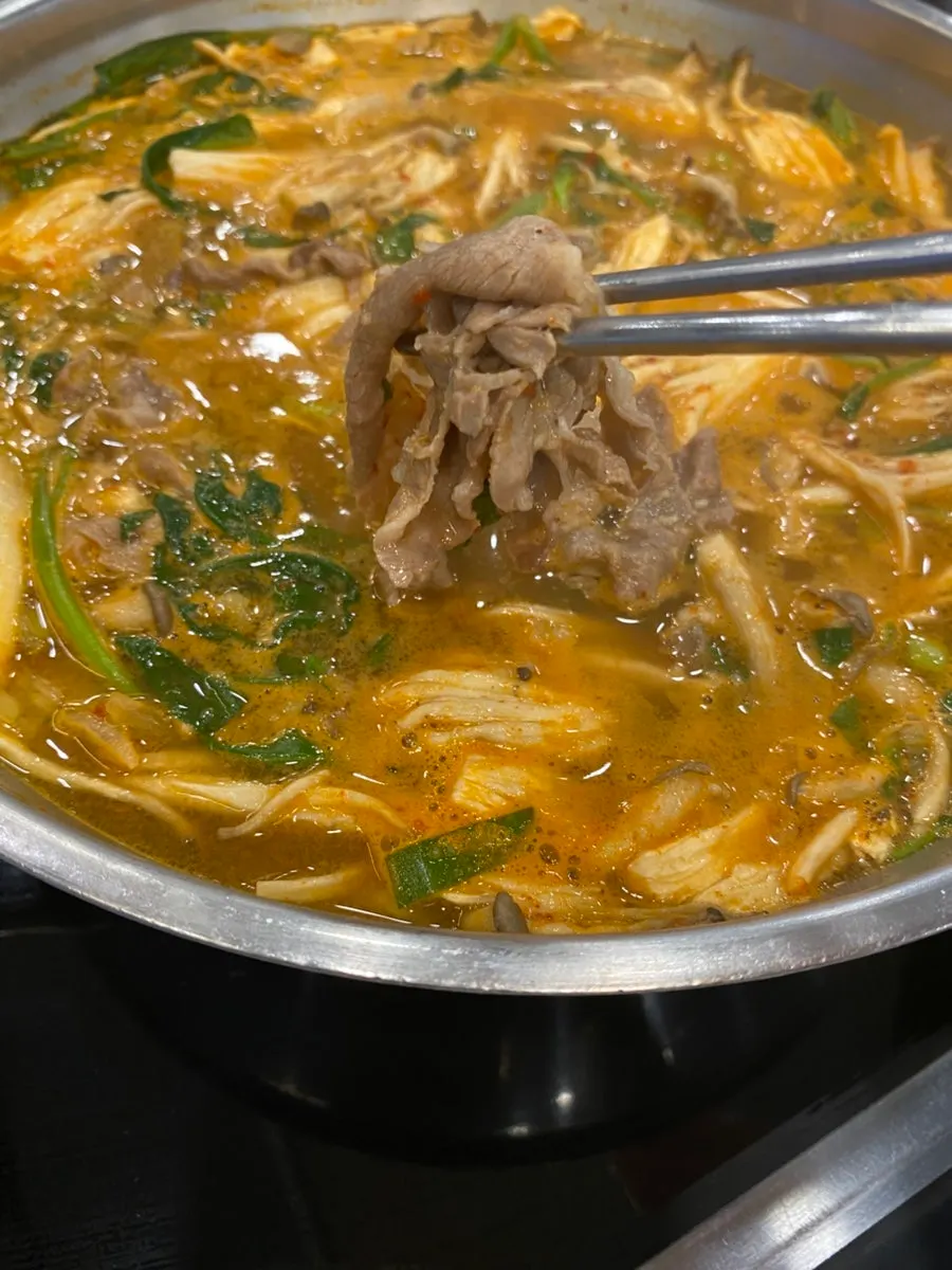 Mushrooms and vegetables cooked in the broth