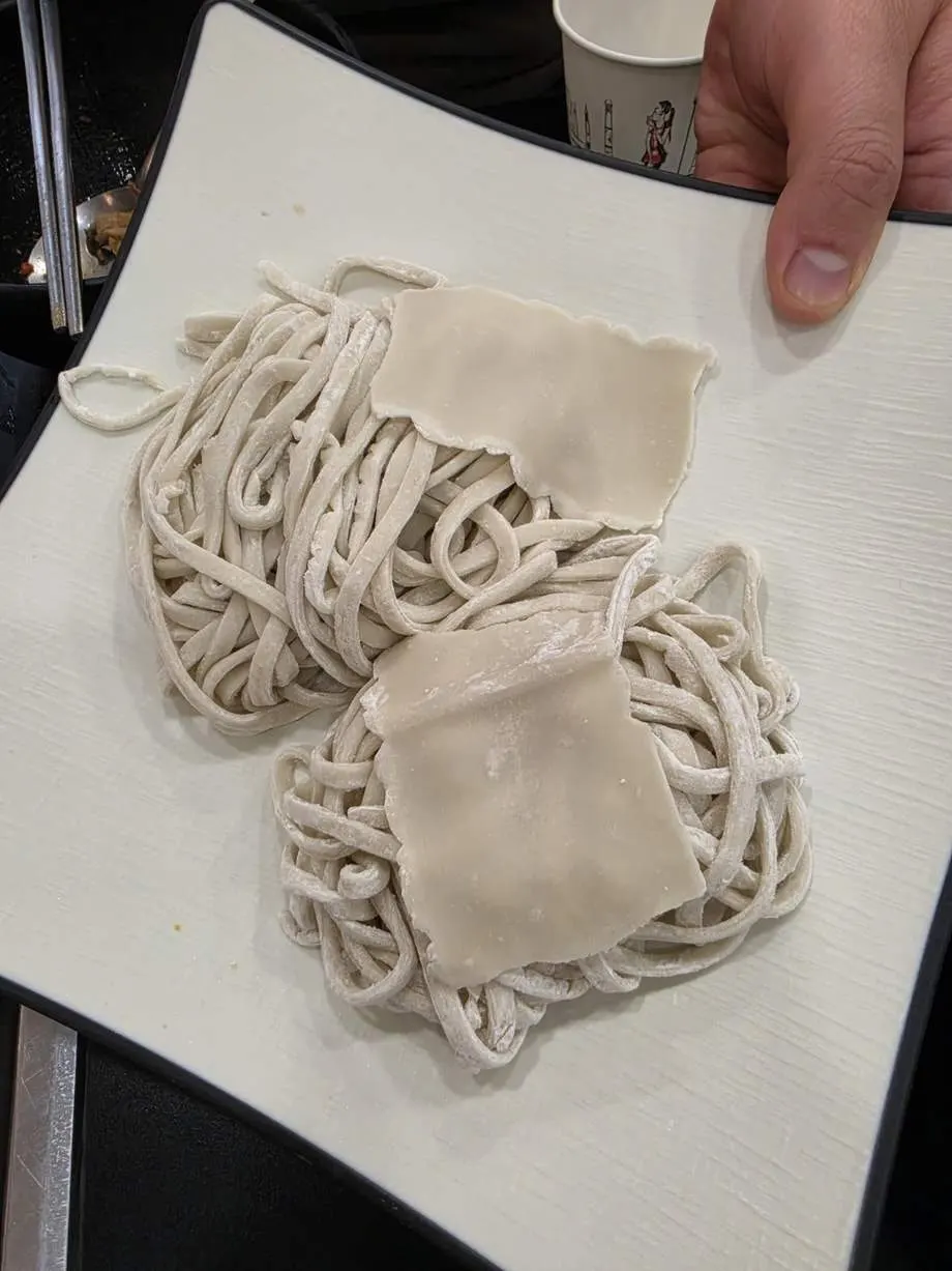 House-made kalguksu noodles with flat noodles mixed in