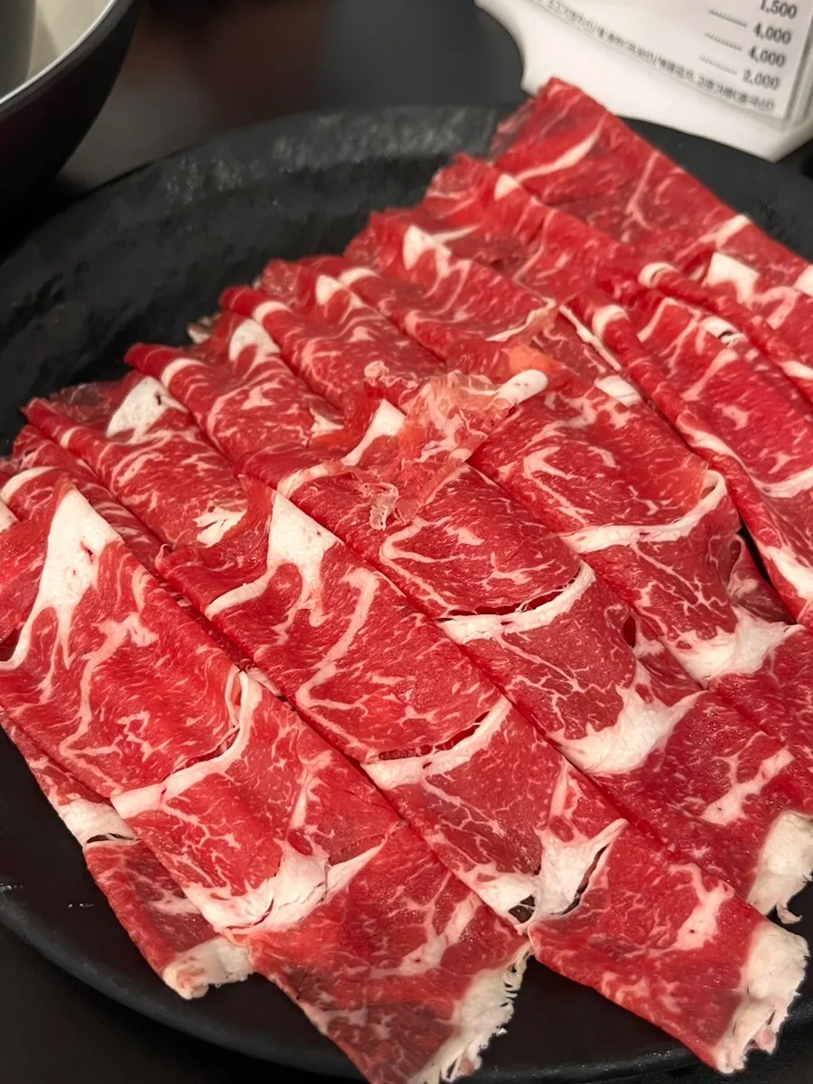 Full table spread at Yunujae Munhyeon Shabu Kalguksu near Munhyeon Station, Busan