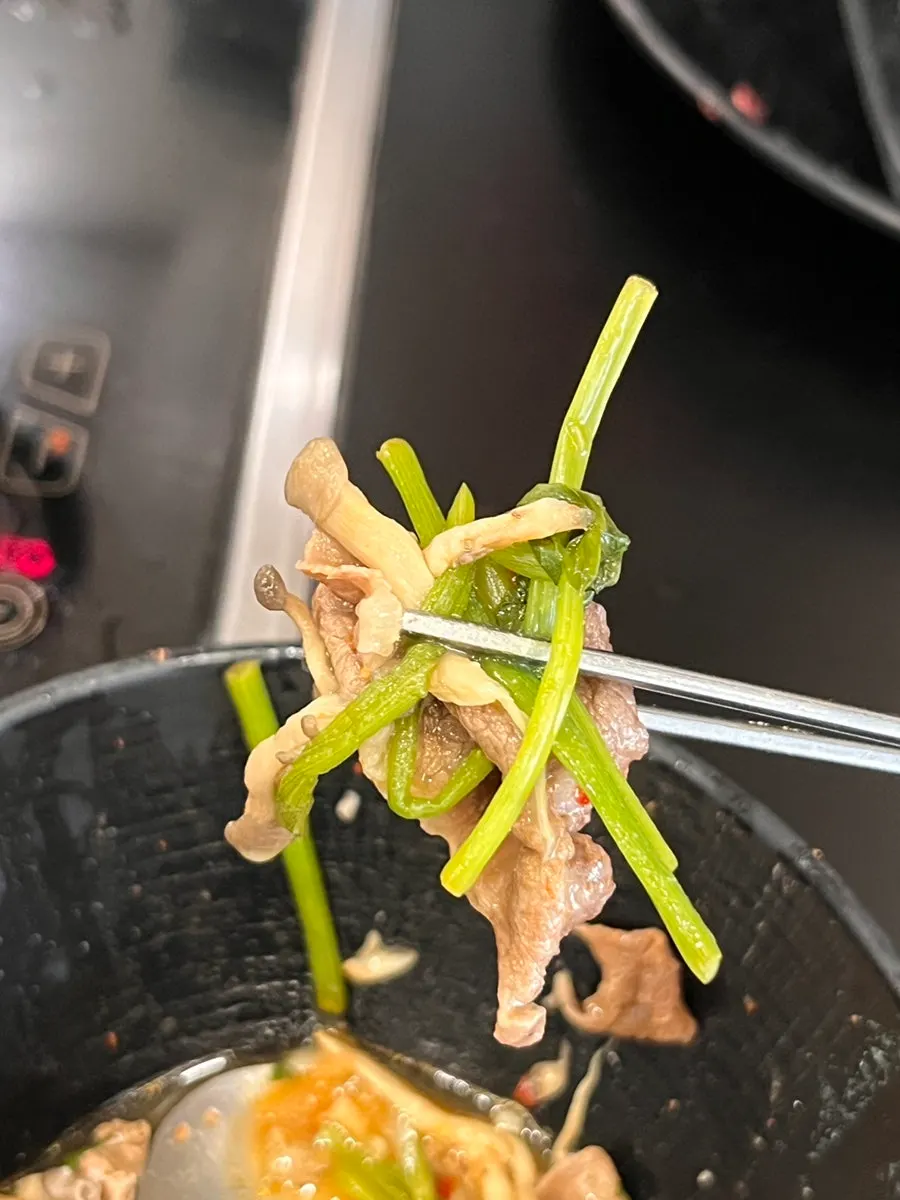 Small plate with meat and vegetables scooped out