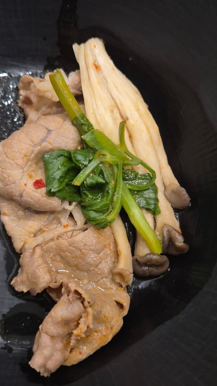 Meat dipped in wasabi soy sauce