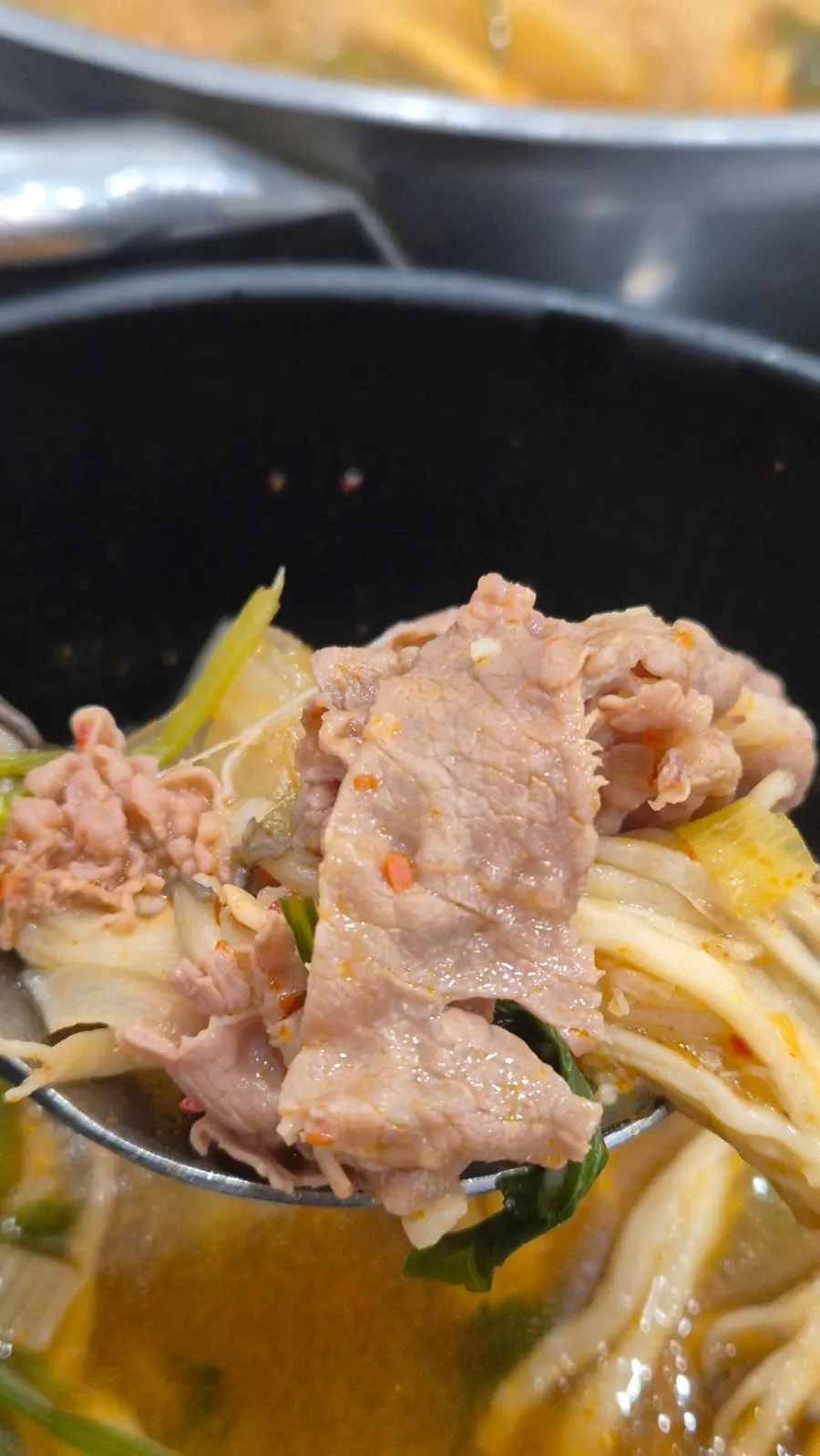 Tender, well-cooked shabu-shabu meat
