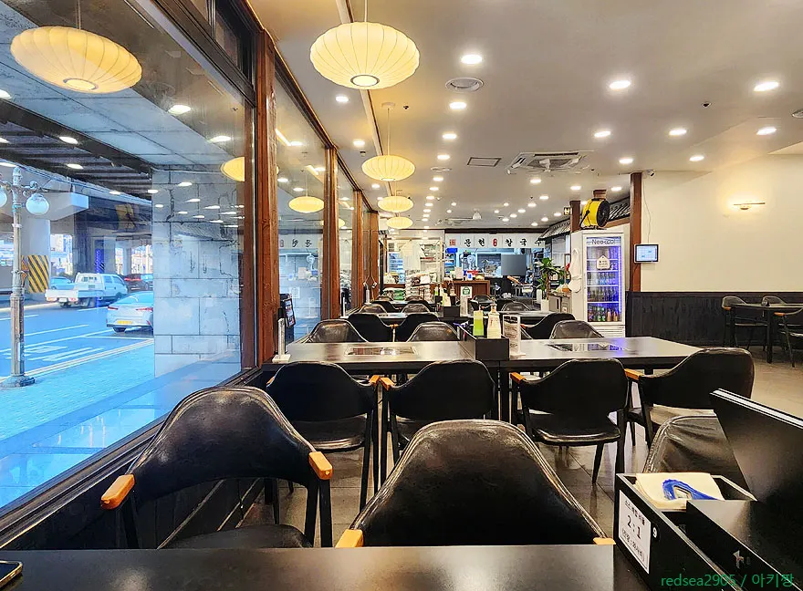 Window seating at Munhyeon Shabu Kalguksu with many tables