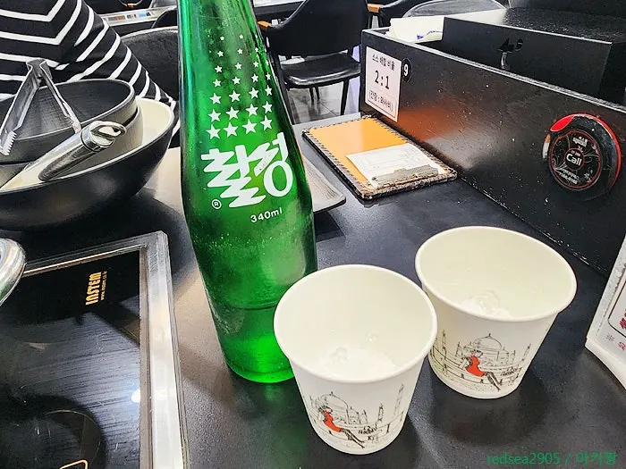 Table set with hot water for sanitizing spoons and chopsticks