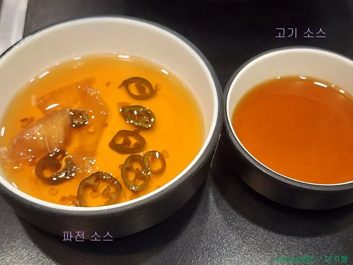Side kimchi and pajeon dipping sauce