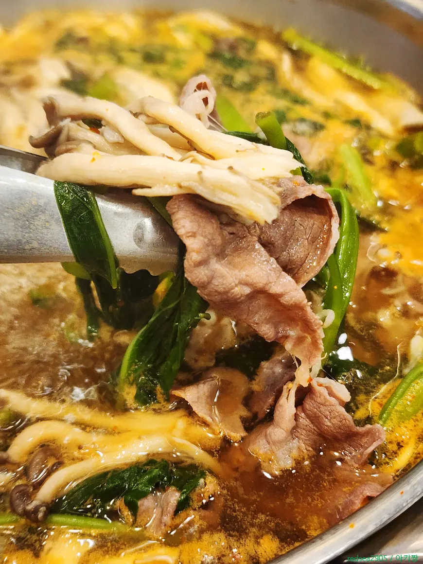 Small plate with cooked meat and vegetables