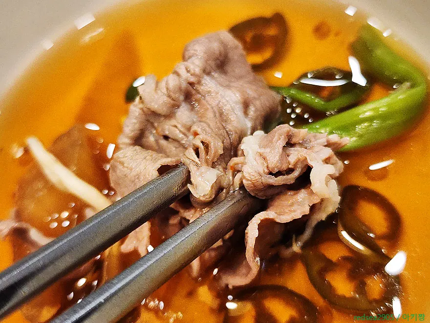 Shabu shabu meat dipped in sauce