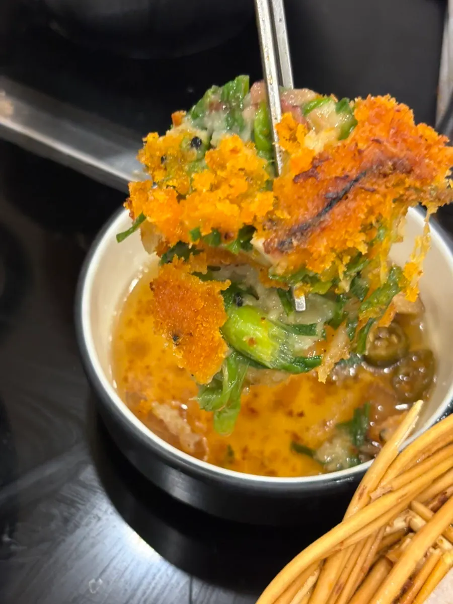 Cross-section of seafood pajeon showing shrimp and squid