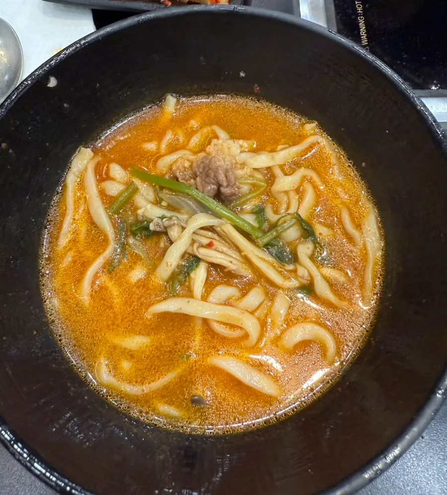 House-made kalguksu noodles added to the broth