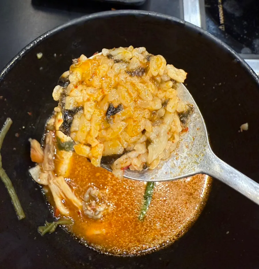 Finishing fried rice made with kimchi