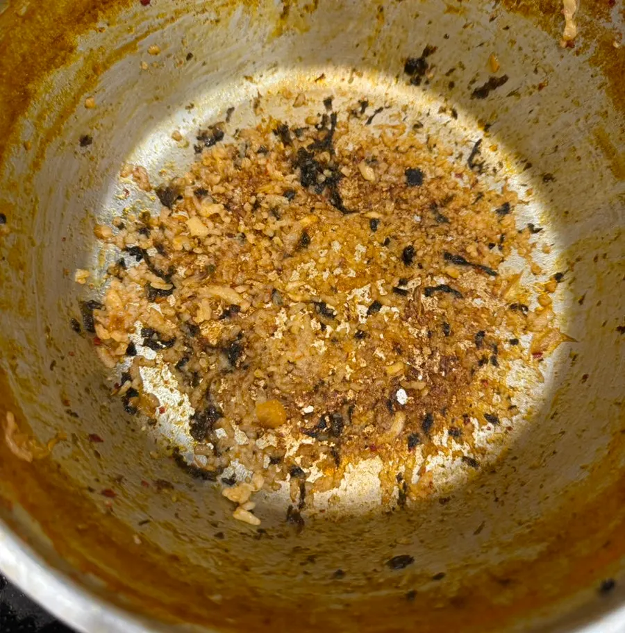 Pot of fried rice scraped completely clean