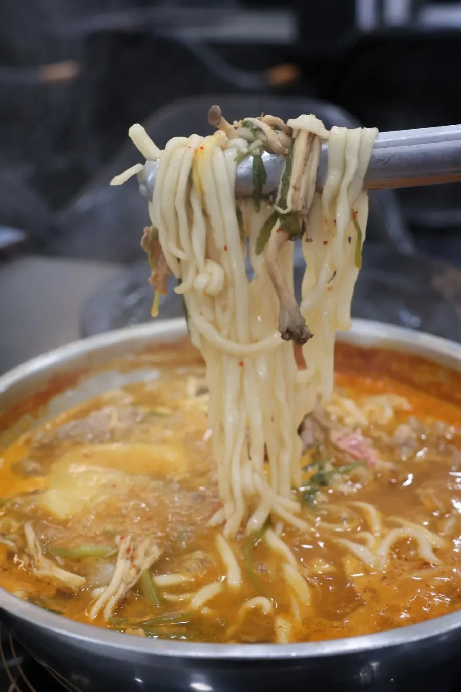 Thick strands of the house-made kalguksu noodles