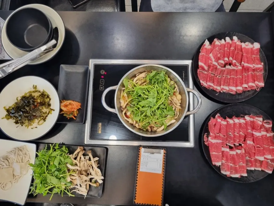A piece of lightly cooked shabu-shabu beef
