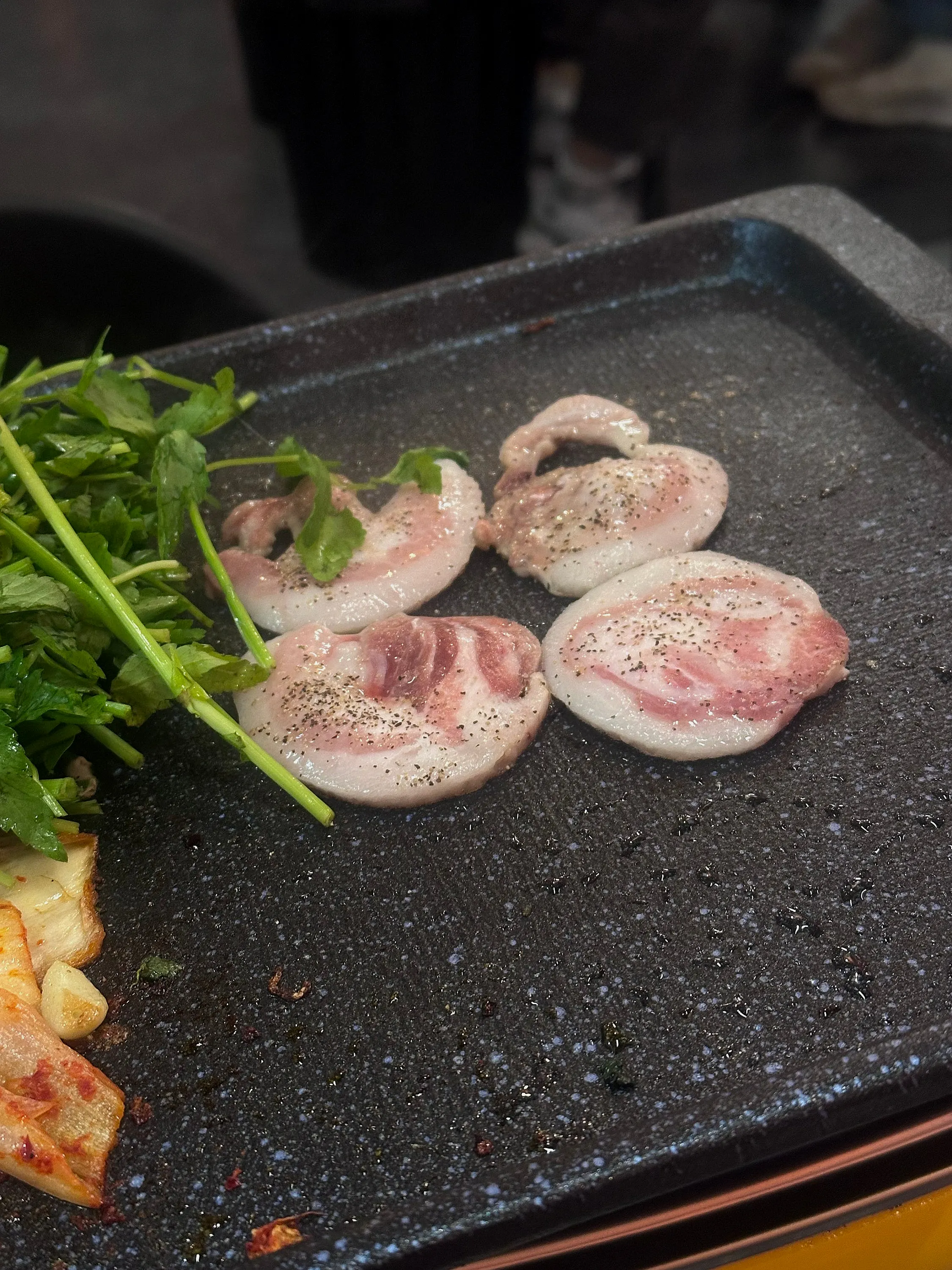 Crispy frozen pork belly eaten with salt