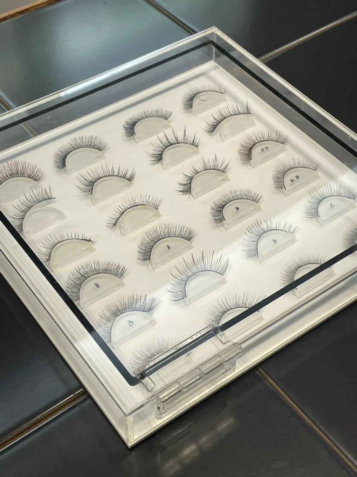 1:1 personalized lash design consultation in progress