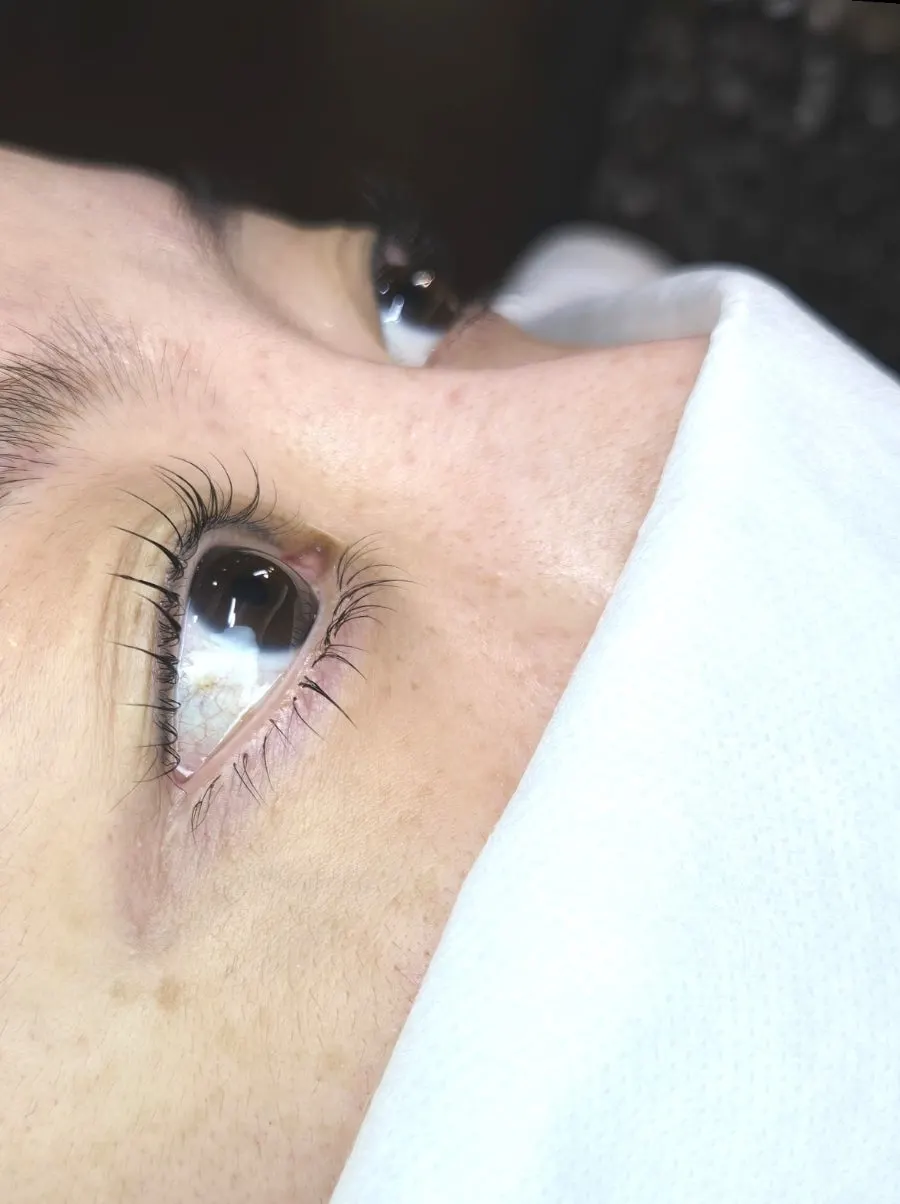 After photo showing finished lash lift and LED under-lash extensions