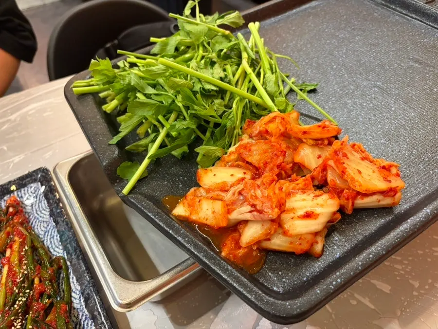 Standard minari and kimchi served with the meal