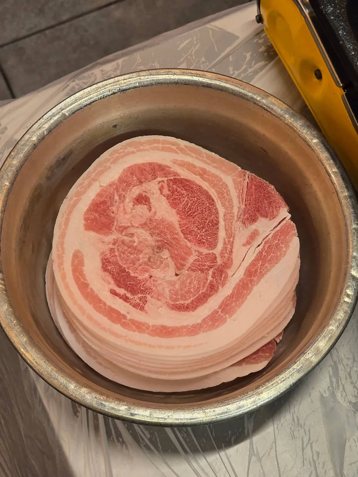 Frozen pork belly served on a plate