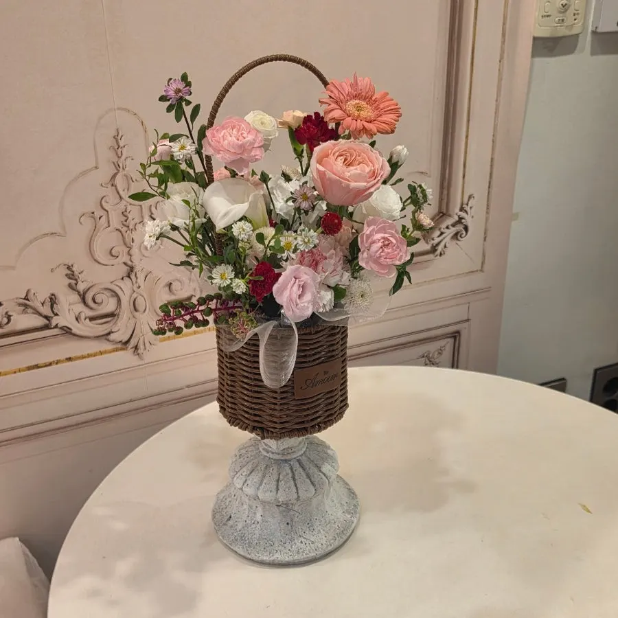 Mini flower basket in white and pink tones
