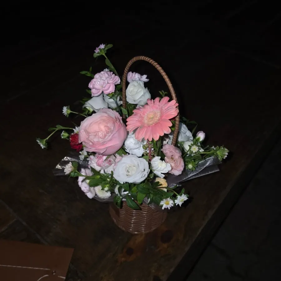 White-and-pink flower basket with a subtle mood