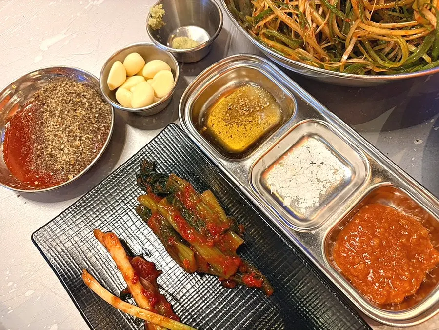 Maldon salt and perilla-seed gochujang among the basic banchan