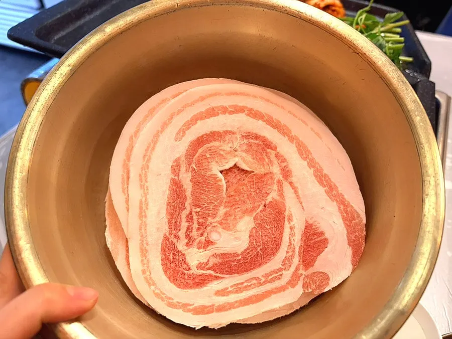 Two servings of minari flower naengsam served in a pot