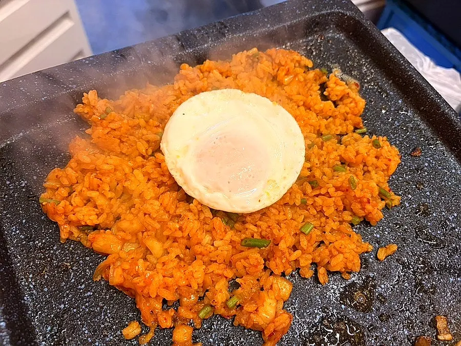 Minari fried rice cooking on the grill