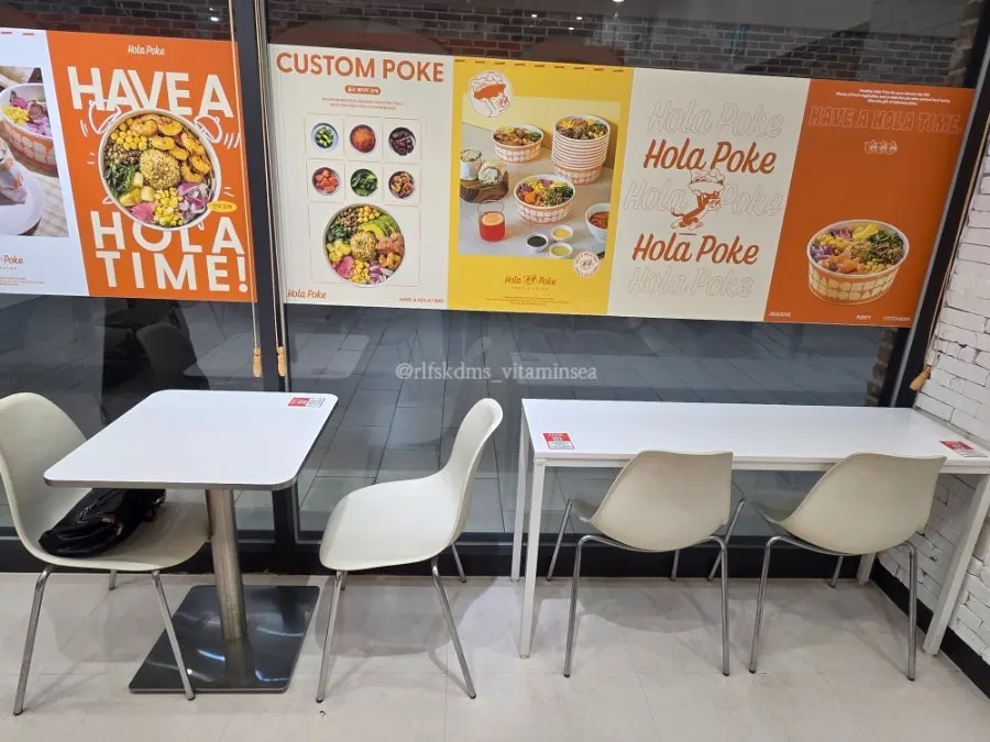 Store view showing hallway-side solo dining seats