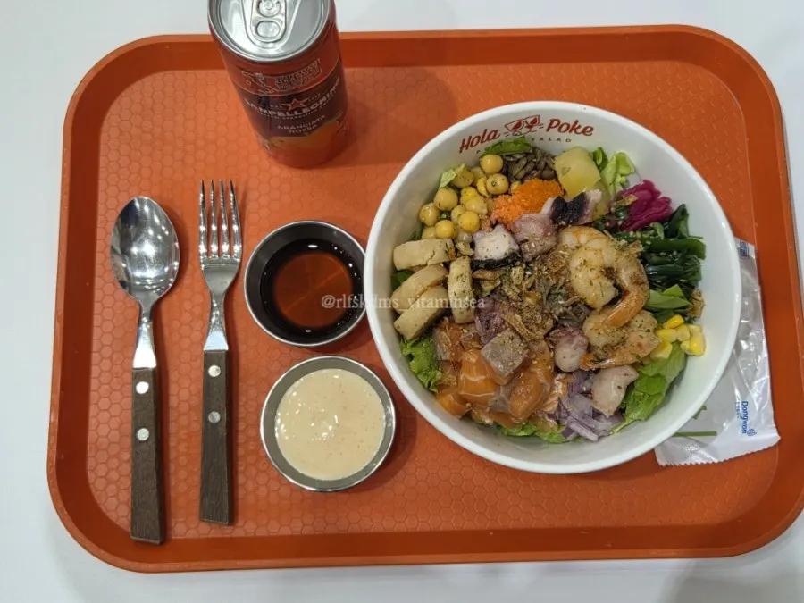 A generously filled bowl of seafood poke