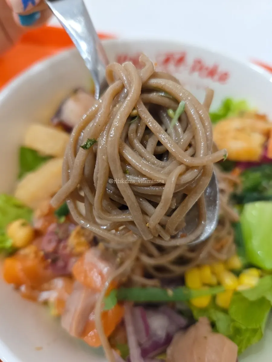 Seafood poke on a buckwheat noodle base