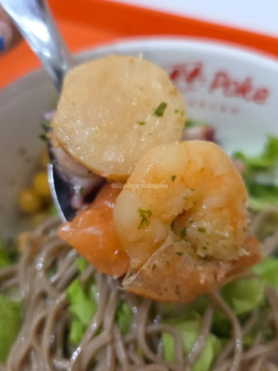 Poke base drizzled with soy dressing