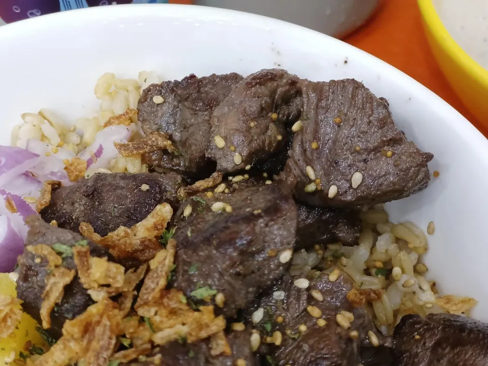 Steak poke piled high with signature salad