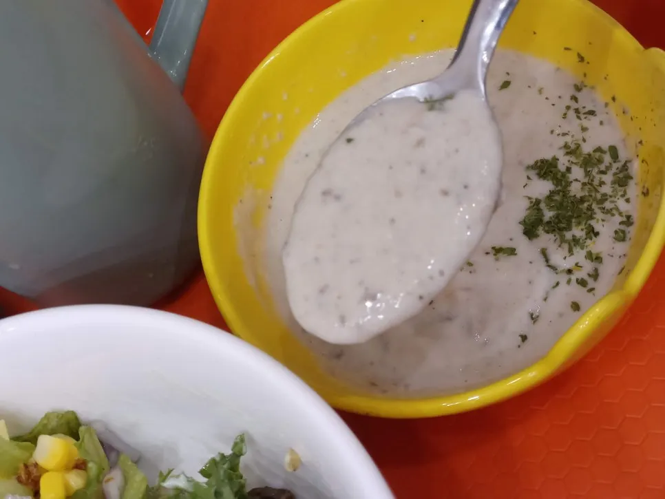 Table setting with poke and mushroom soup together