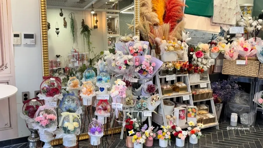 Interior of the flower shop with a variety of fresh flowers on display
