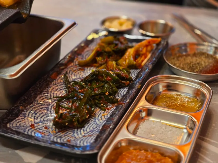 Table spread with basic side dishes and minari