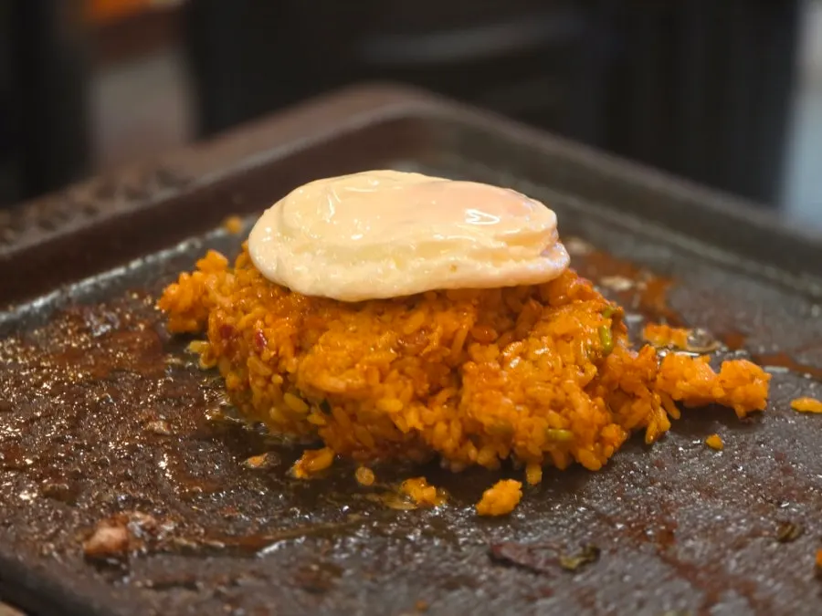 Crispy jeotgal fried rice stuck to the grill