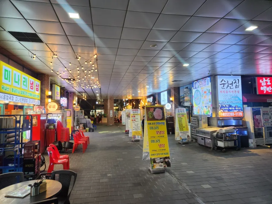 Outdoor seating area in front of Minari Naengsam