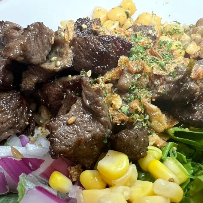 Steak poke made with colorful ingredients