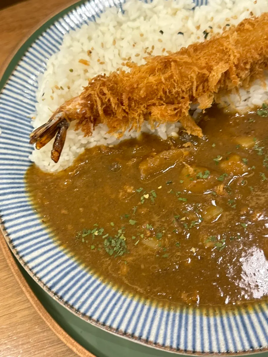 Shrimp tempura ichiban curry topped with fried shrimp