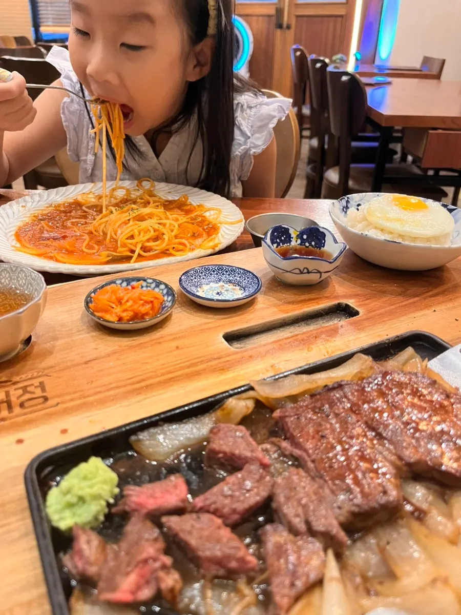 Dinner alternating bites of steak and pasta