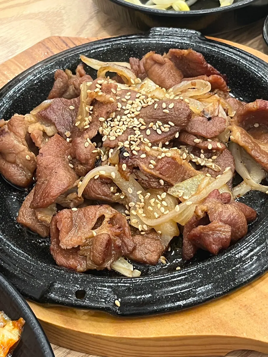 Jjusamsae sauce spooned over flying fish roe rice balls