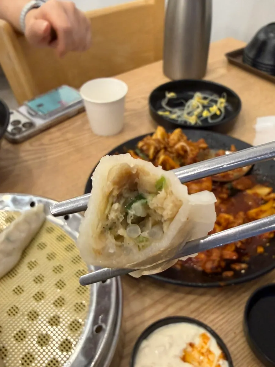 Freshly steamed, elongated shrimp mandu