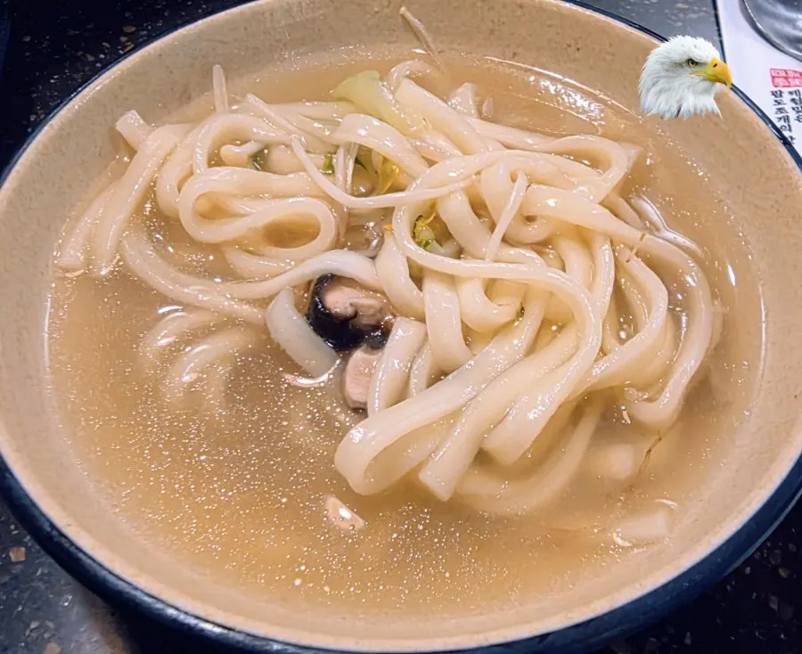 Fresh knife-cut noodles served in a jar