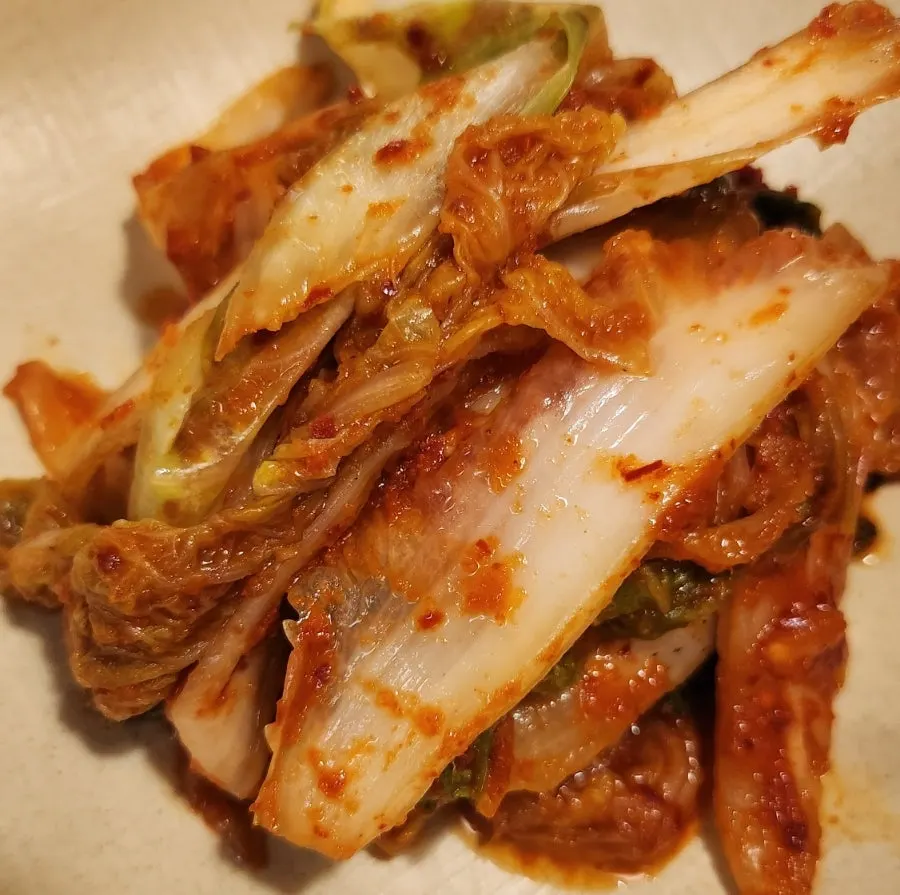 Boiled kalguksu noodles with homemade napa cabbage kimchi