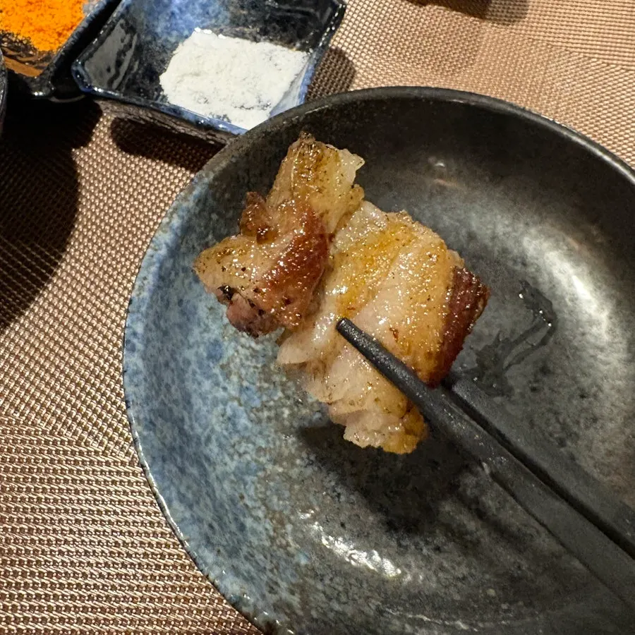 A grilled piece of shoulder rack